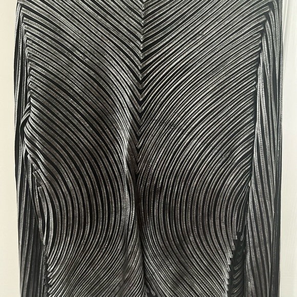 Leather-like jacket that is a great compliment to any black outfit. - Picture 3 of 6